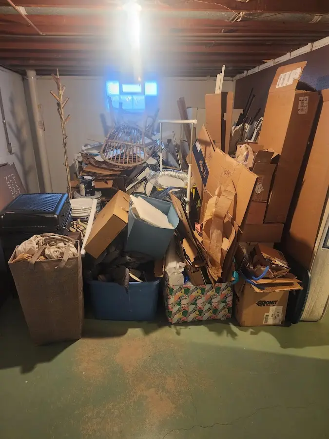 Roll-off dumpster container at job site for 2 Yard Dumpster Rental in Mount Airy